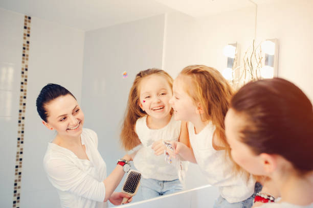 istock Cute family have fun in a bathroom 1142742494