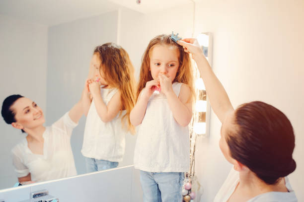 istock Cute family have fun in a bathroom 1142742497