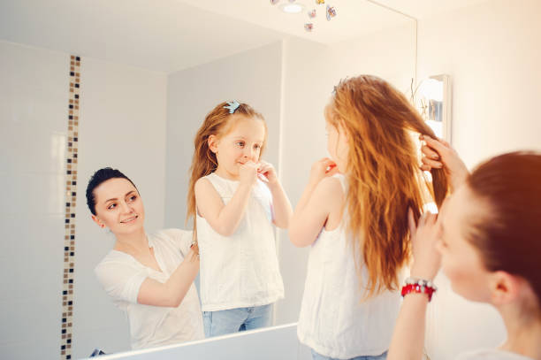 istock Cute family have fun in a bathroom 1142742517