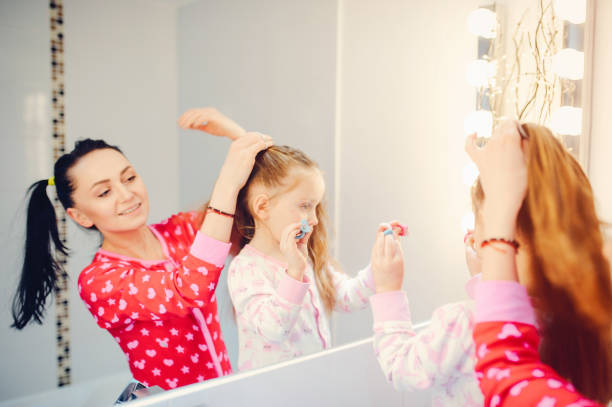 istock Cute family have fun in a bathroom 1142743538