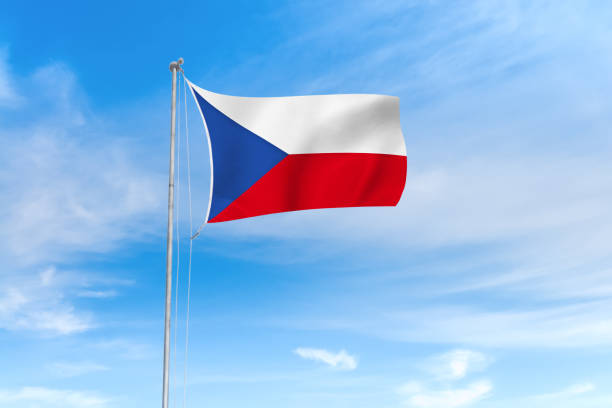 istock Czech flag over blue sky background 1142744525