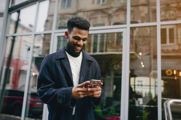 istock Black man in a city 1142744561
