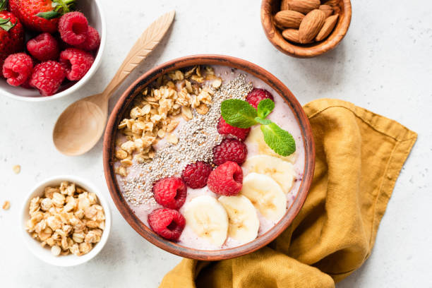 Acai smoothie bowl with superfood top view
