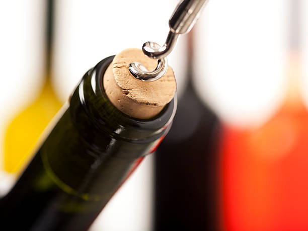 istock opening a bottle of wine 114274512