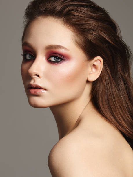 istock Beautiful girl with bright make-up 1142745461