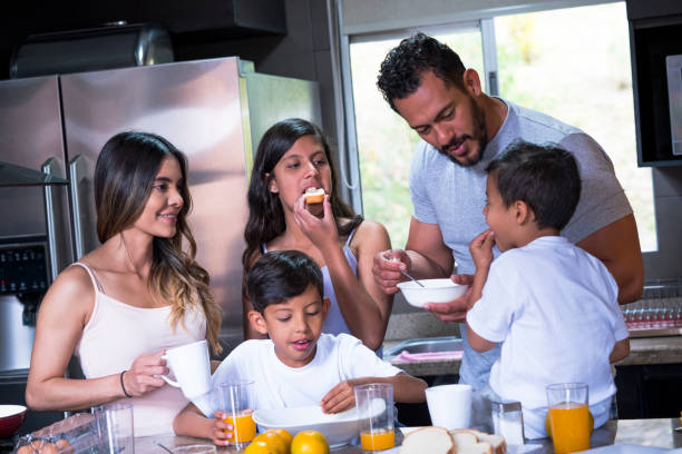 istock Family having breakfast in the kitchen 1142748681