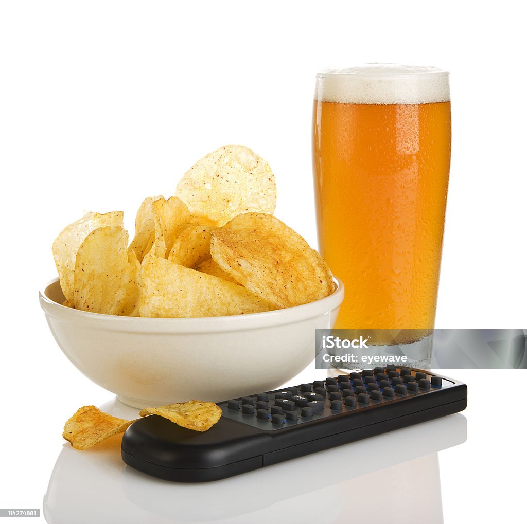 potato chips, beer and remote control isolated  Alcohol - Drink Stock Photo