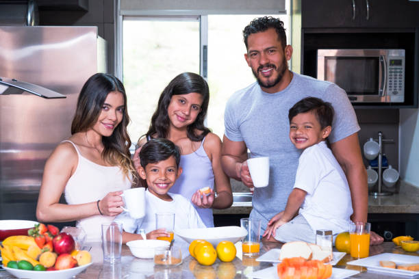istock Family having breakfast in the kitchen 1142748924