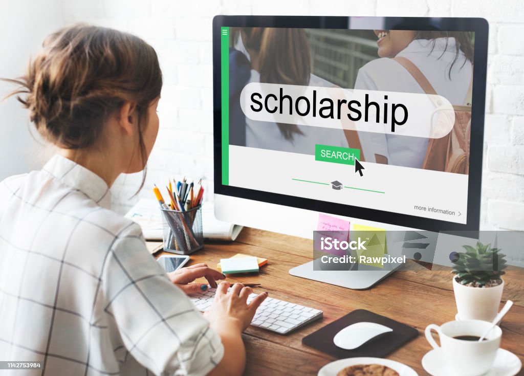 Student looking for scholarships Online education Scholarship Stock Photo