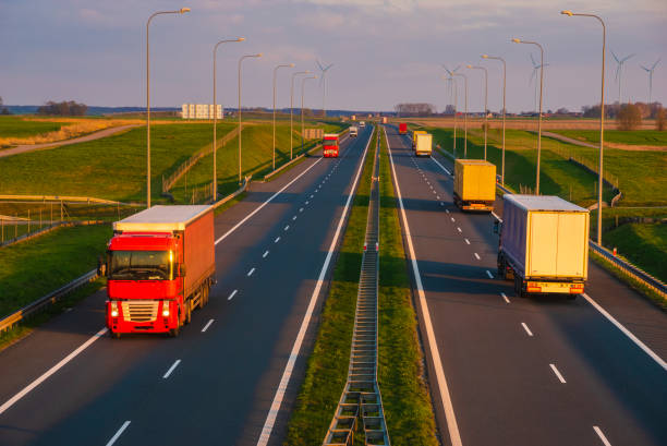 istock Highway traffic in sunset 1142756934