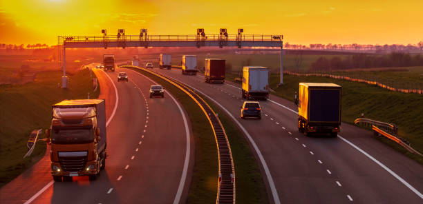 istock Highway traffic in sunset 1142756951