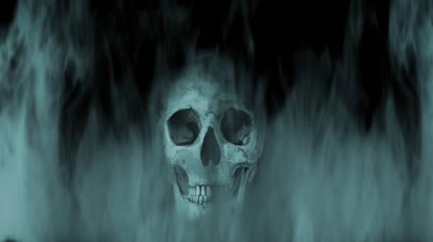 istock Digital illustration art. Skull into the smoke. 1142757593