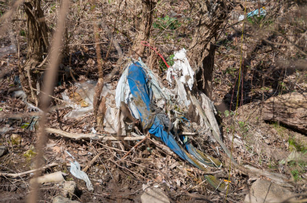 istock Plastic and foam garbage floating on the surface of the river 1142765012