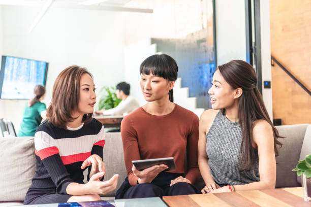 istock Asian business people are discussing issues 1142768013