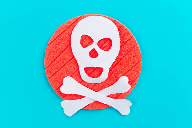 skull and crossbones made of paper. red background