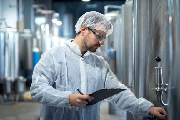 istock Professional technologist checking production in factory. Industrial worker with tablet in production plant. 1142769314