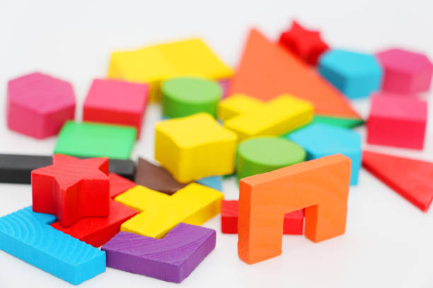 istock Cubes and figures with numbers laid out randomly on a white background. 1142770542