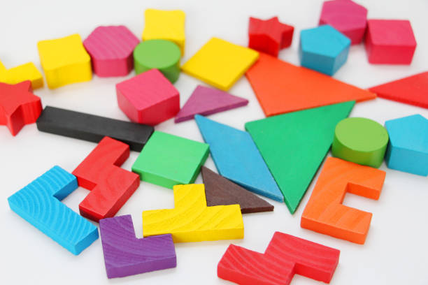 istock Cubes and figures with numbers laid out randomly on a white background. 1142770653