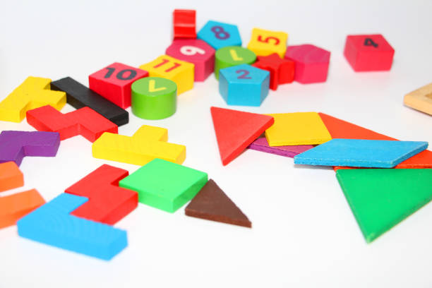 istock Cubes and figures with numbers laid out randomly on a white background. 1142770754