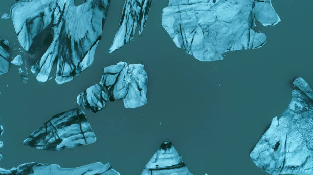 istock Glacier lagoon with dramatic sky. Ice cracks. Aerial view 1142771241
