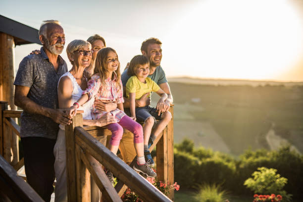 istock Happy extended family enjoying in a view from a terrace. 1142772272