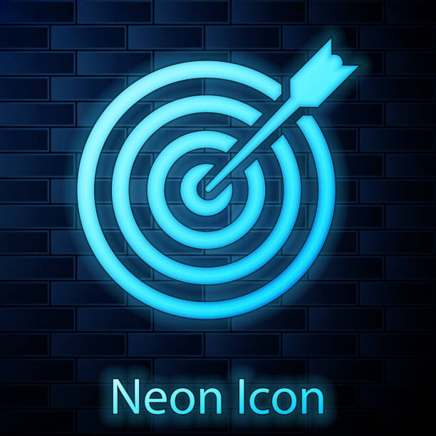 istock Glowing neon Target with arrow icon isolated on brick wall background. Dart board sign. Archery board icon. Dartboard sign. Business goal concept. Vector Illustration 1142772928