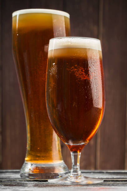 istock beer glass on a wooden background 1142775923