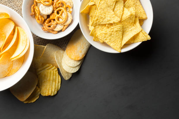 istock Salty snacks. Pretzels, chips, crackers 1142780504