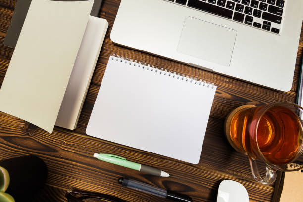istock Top view wooden office  desk  with copy space - Image 1142782874