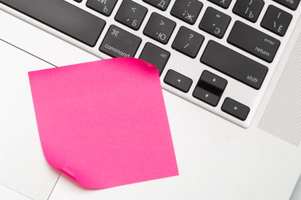 istock Sticky note on laptop with copy space. For all concept - Image 1142782904