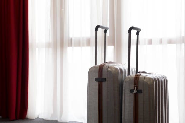 istock Suitcase or luggage bag in a modern hotel room 1142786267