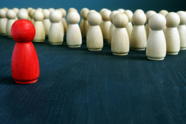 istock Management and leadership concept. Leader in front of crowd. 1142788229