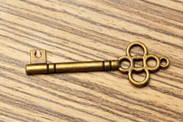 istock old key on wooden table 1142788283