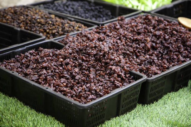 Dry organic sweet grapes in food market, natural food