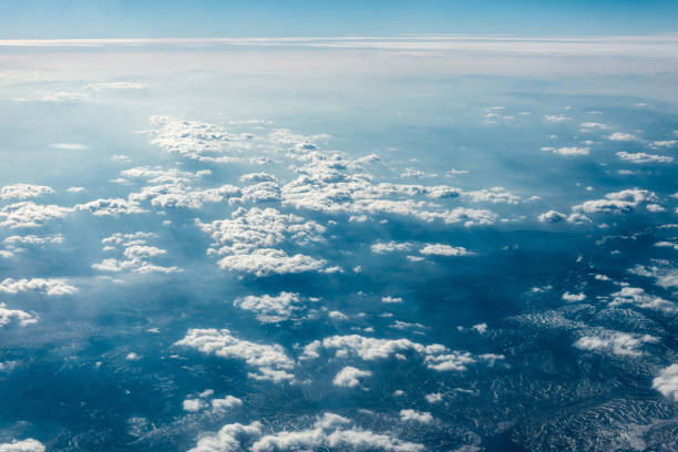 istock Top view of white clouds above the ground or water 1142790573