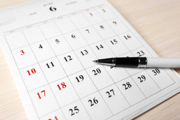 istock calendar on wooden table 1142790610