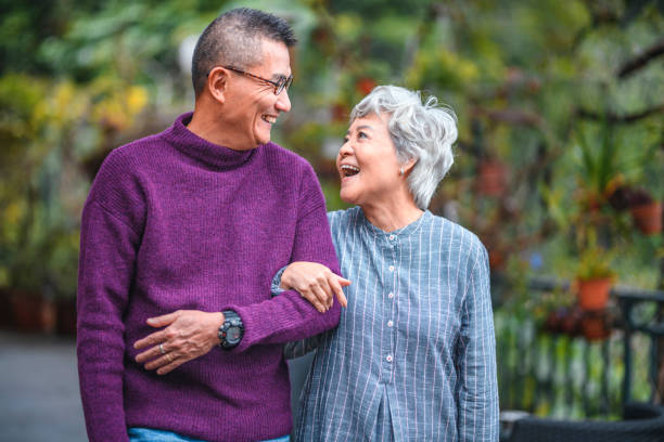 istock Smiling senior couple standing at back yard 1142791452