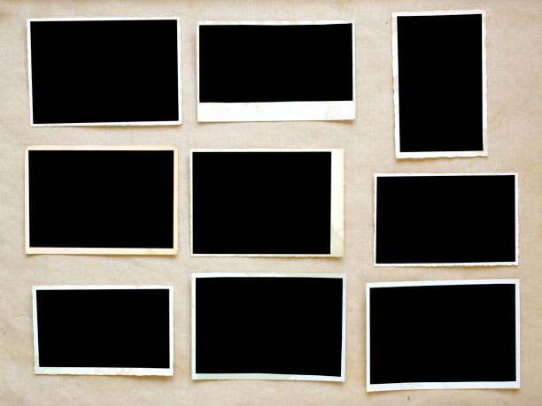 istock old empty photo frames, vintage photo prints on canvas with free pics space 1142791617