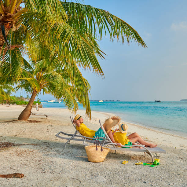 istock Family with three year old boy on beach 1142792342