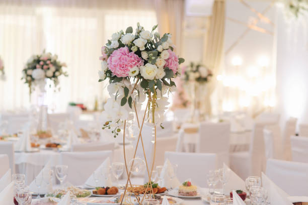 istock Wedding bouquet in restaurant on the table. Pink and white flowers. Rose and hydrangea 1142794238