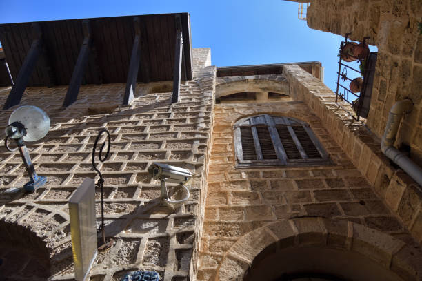 Stone steps leading through a narrow passage in the historic district of Old Jaffa
