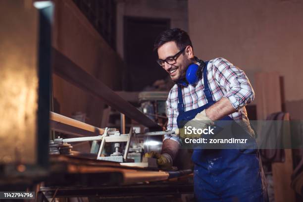 Carpenters At Work Stock Photo - Download Image Now - 30-39 Years, Adult, Adults Only