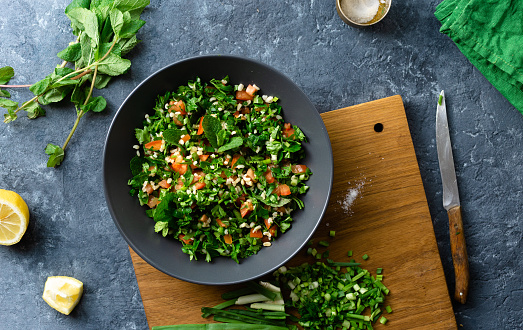 Raw ingredients cooking salad tabouli top view Healthy food