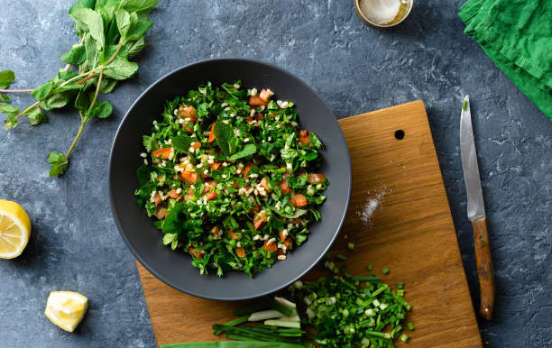 raw ingredients cooking salad tabouli healthy food - lebanese culture imagens e fotografias de stock