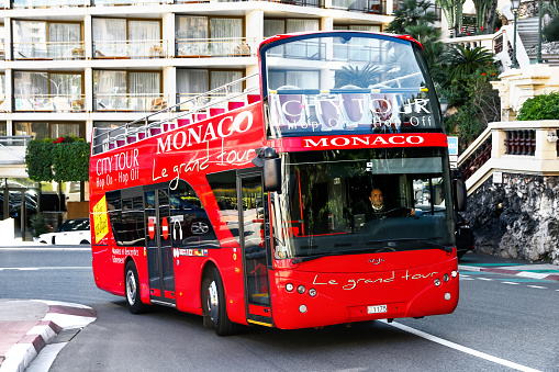 Monte-Carlo, Monaco - March 12, 2019: Red sightseeing bus Ayats Bravo I in the city street.