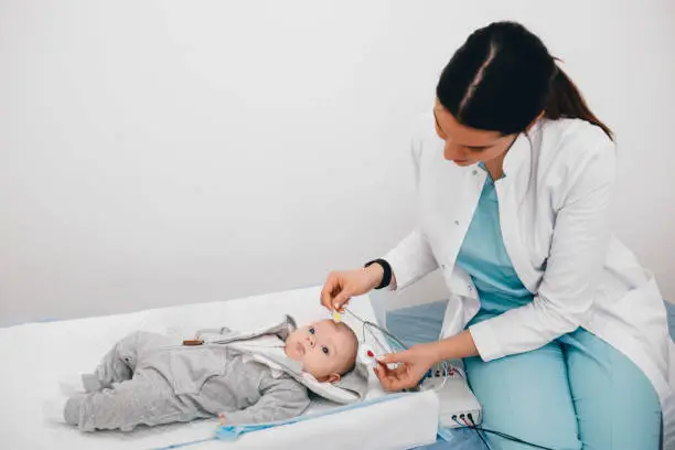 Photo of Hearing Test baby , Cortical auditory evoked potential analyzer. hearing screening