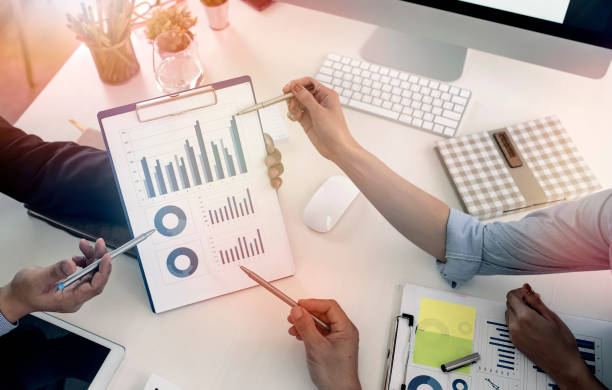 istock Business team meeting working with new startup project, discussion and analysis data the charts and graphs. 1142803636