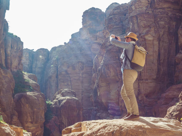 istock Man with a mobile phone. Petra, Jordan 1142805348