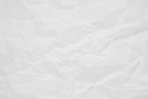 istock Abstract background from creased white paper texture with grunge. 1142805832