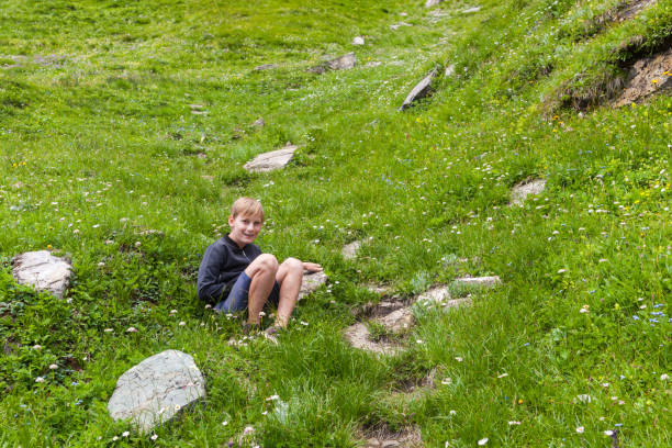 istock A boy on an alpine meadow 1142810819